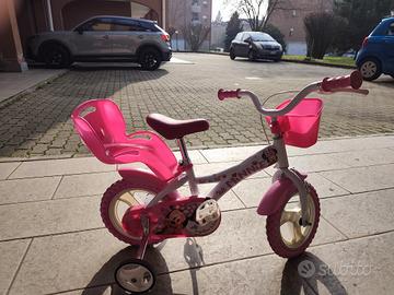 Biciletta bambina taglia 14-rosa e bianca
