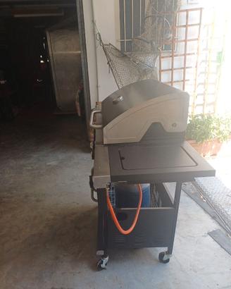 BARBECUE A GAS