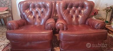 Divano e poltrone pelle capitonnè Roche Bobois