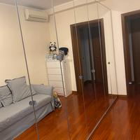 Armadio a 9 ante vetro