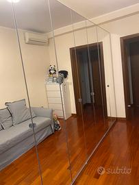 Armadio a 9 ante vetro