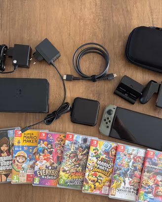 Nintendo Switch OLED + 8 Giochi e Accessori
