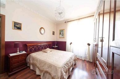 Camera da letto stile classico