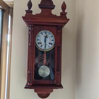 Orologio a pendolo meccanico da parete