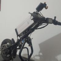 Propulsore elettrico per carrozzina