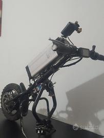 Propulsore elettrico per carrozzina