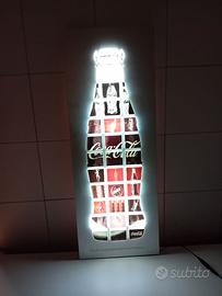 Insegna luminosa coca cola