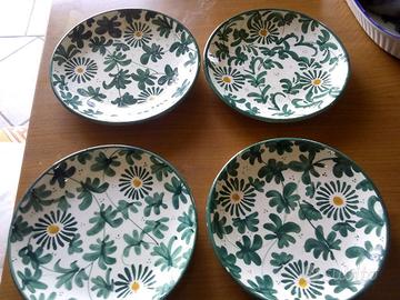 piatti da arredo in ceramica decorati a mano