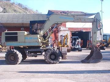 Escavatore usato Gommato HYDROMACH HG85 Turbo