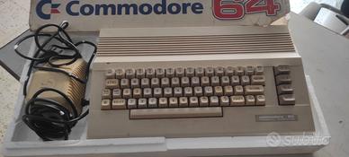 COMMODORE 64 + LETTORI + STAMPANTE + ECC.