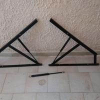 Leve di sollevamento letto contenitore pistoni