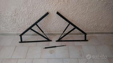 Leve di sollevamento letto contenitore pistoni