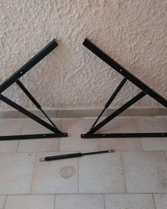 Leve di sollevamento letto contenitore pistoni
