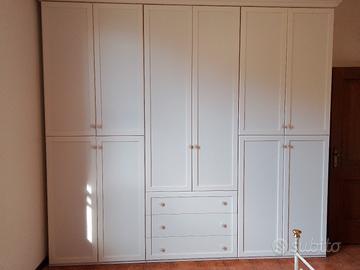 Armadio 6 ante con cassettiera centrale