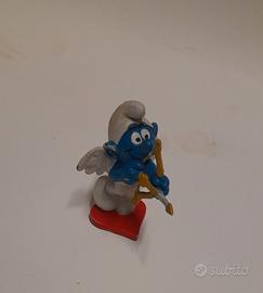 puffi, casa dei puffi e cassetta video vhs