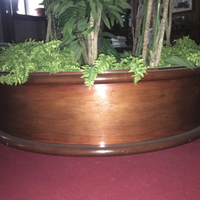 Elegante fioriera in noce massello