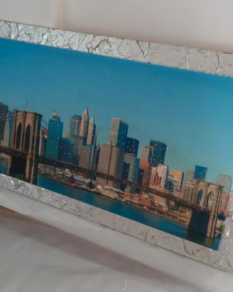 Quadro con cornice argento. 