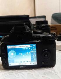 Nikon D-3000 con accessori