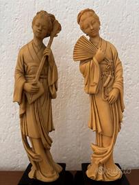statuette orientali in resina antiche