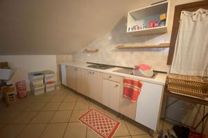 Bilocale mansardato arredato