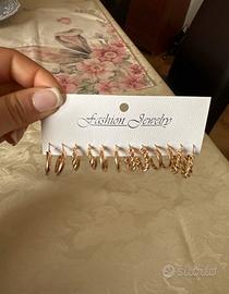 6 paia di orecchini color oro