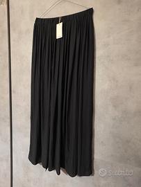 Gonna lunga nera Motivi