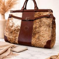 borsone da viaggio pelle di mucca dalla Patagonia 