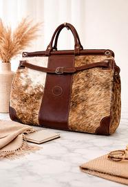 borsone da viaggio pelle di mucca dalla Patagonia 