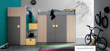 Cameretta soppalco con due letti e cabine armadio