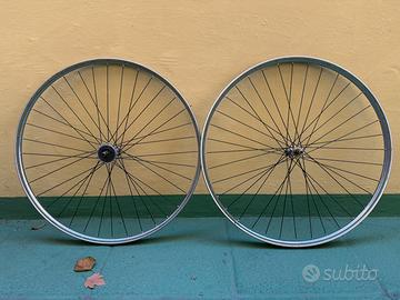 Cerchi 28x3/8 cromati, mozzi bianchi anni 30