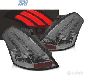 FANALI SUZUKI SWIFT V 10-17 NUOVA STRISCIA LED FUM