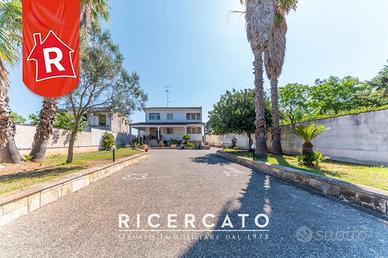 Villa di 400 m² con più di 5 locali e box auto a L