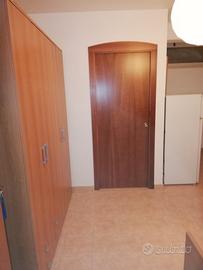 Camera uso deposito con bagno