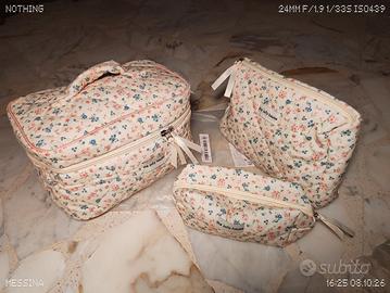 set di tre pochette 
