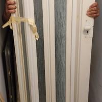 porta a soffietto bianca con vetro