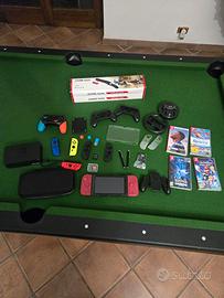 Mega bundle Nintendo switch + 4 giochi+5 Joy-con 