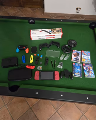 Mega bundle Nintendo switch + 4 giochi+5 Joy-con 