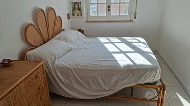 Camera da letto vintage, coloniale, vimini rattan