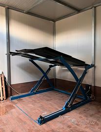Ponte elevatore per due auto in box