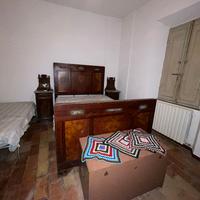 Letto e comodini di pregio