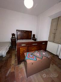 Letto e comodini di pregio