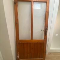 Porta in legno con vetro