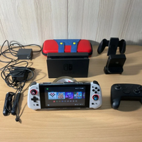 Nintendo Switch + Scheda SD + Giochi e Accessori