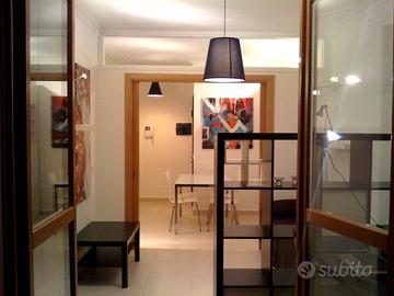 Appartamento roma via truffi - stanza arredata