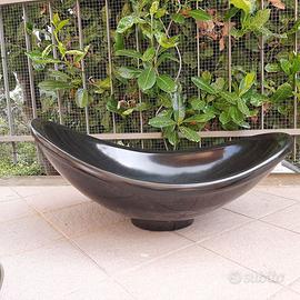 Lavabo soprapiano nero in pietra naturale