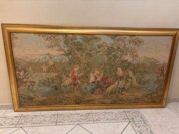 Grande arazzo tessuto con cornice dorata