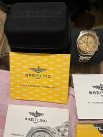 Breitling Chronomat oro/acc