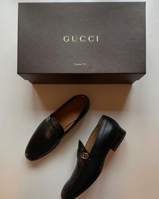 Mocassini neri Gucci spaiati