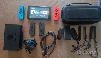 Nintendo Switch+custodia+seconda coppia joycon+SD