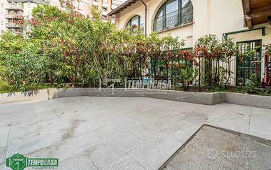 ESCLUSIVO TRILOCALE CON TERRAZZO E GIARDINO PRIVAT